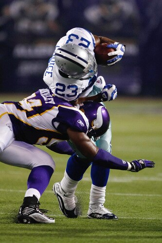MINNEAPOLIS, MN - SEPTEMBER 4: Running back Tashard Choice #23 of the Dallas Cowboys runs with the football as he is hit by linebacker Jasper Brinkley #54 of the Minnesota Vikings at Hubert H. Humphrey Metrodome on September 4, 2009 in Minneapolis, Minnesota. <br /><br /><span class="help">(Photo by Scott Boehm/Getty Images)</span>
