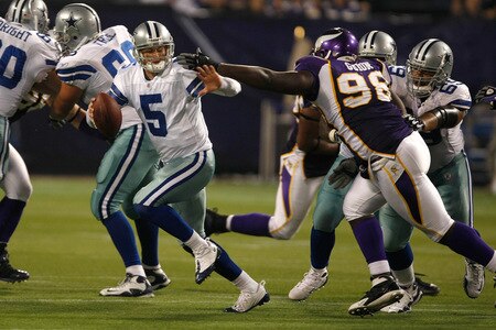MINNEAPOLIS, MN - SEPTEMBER 4:  Quarterback Rudy Carpenter #5 of the Dallas Cowboys comes under pressure while looking to pass against the Minnesota Vikings at Hubert H. Humphrey Metrodome on September 4, 2009 in Minneapolis, Minnesota. The Cowboys defeated the Vikings 35-31. <br /><br /><span class="help">(Photo by Scott Boehm/Getty Images)</span>