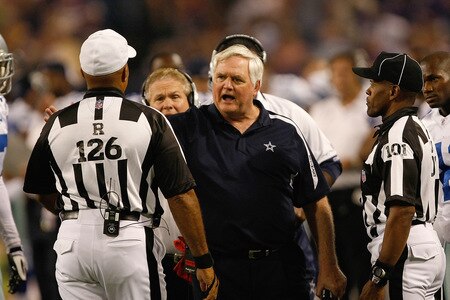 MINNEAPOLIS, MN - SEPTEMBER 4:  Head coach Wade Phillips of the Dallas Cowboys talks with referee Don Carey and line  judge Carl Johnson #101 during action against the Minnesota Vikings at Hubert H. Humphrey Metrodome on September 4, 2009 in Minneapolis, Minnesota. The Cowboys defeated the Vikings 35-31. <br /><br /><span class="help">(Photo by Scott Boehm/Getty Images)</span>