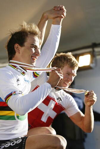 CANBERRA, AUSTRALIA - SEPTEMBER 05: Nino Schurter (L) 1st and Florian Vogel (R) 3rd both of Switzerland hold their medals after the men's elite cross country race during the 2009 Mountain Bike & World Trials World Championship held at Mt Stromlo on September 5, 2009 in Canberra, Australia.  <br /><br /><span class="help">(Photo by Stefan Postles/Getty Images)</span>