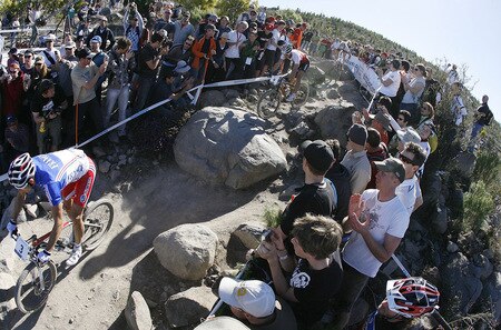CANBERRA, AUSTRALIA - SEPTEMBER 05:  Julian Absalon (L) of France, Nino Schurter of Switzerland (C) and Florian Vogel (R) in action in the men's elite cross country olympic race during the 2009 Mountain Bike & World Trials World Championship held at Mt Stromlo on September 5, 2009 in Canberra, Australia.  <br /><br /><span class="help">(Photo by Stefan Postles/Getty Images)</span>