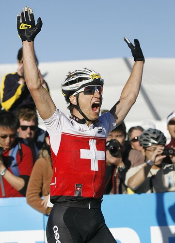 CANBERRA, AUSTRALIA - SEPTEMBER 05:  Nino Schurter of Switzerland celebrates his win in the men's elite cross country olympic race during the 2009 Mountain Bike & World Trials World Championship held at Mt Stromlo on September 5, 2009 in Canberra, Australia.  <br /><br /><span class="help">(Photo by Stefan Postles/Getty Images)</span>