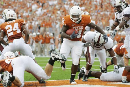AUSTIN, TX - SEPTEMBER 5:  Running back Cody Johnson #31 of the Texas Longhorns scores the first touchdown against of the Louisiana Monroe Warhawks in the first quarter on September 5, 2009 at Darrell K Royal-Texas Memorial Stadium in Austin, Texas.  <br /><br /><span class="help">(Photo by Brian Bahr/Getty Images)</span>