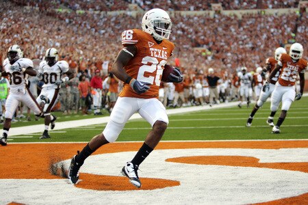 AUSTIN, TX - SEPTEMBER 5:  D.J. Monroe #26 of the Texas Longhorns returns a kickoff for a touchdown against the Louisiana Monroe Warhawks in the second quarter on September 5, 2009 at Darrell K Royal-Texas Memorial Stadium in Austin, Texas.  <br /><br /><span class="help">(Photo by Brian Bahr/Getty Images)</span>