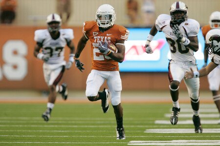 AUSTIN, TX - SEPTEMBER 05:  D.J. Monroe #26 of the Texas Longhorns returns a kickoff for a touchdown against the Louisiana Monroe Warhawks in the second quarter on September 5, 2009 at Darrell K Royal-Texas Memorial Stadium in Austin, Texas.  <br /><br /><span class="help">(Photo by Brian Bahr/Getty Images)</span>