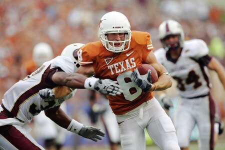AUSTIN, TX - SEPTEMBER 05:  Jordan Shipley #8 of the Texas Longhorns picks up a big first down on a reception against defensive back Darius Prelow #37 of the Louisiana Monroe Warhawks on September 5, 2009 at Darrell K Royal-Texas Memorial Stadium in Austin, Texas.  <br /><br /><span class="help">(Photo by Brian Bahr/Getty Images)</span>