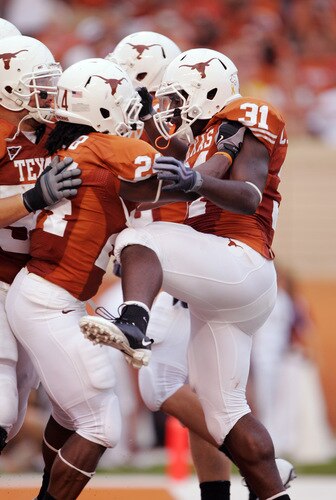 AUSTIN, TX - SEPTEMBER 05:  Running back Cody Johnson #31 of the Texas Longhorns celebrates his third touchdown against the Louisiana Monroe Warhawks in the second quarter on September 5, 2009 at Darrell K Royal-Texas Memorial Stadium in Austin, Texas.  <br /><br /><span class="help">(Photo by Brian Bahr/Getty Images)</span>