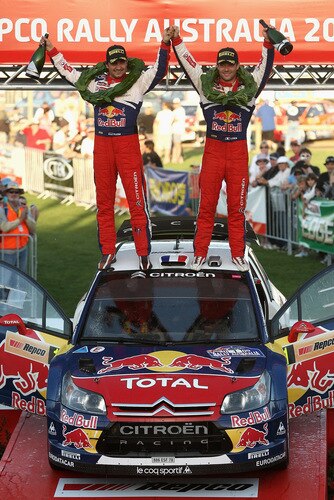 KINGSCLIFF, AUSTRALIA - SEPTEMBER 06:  Sebastien Loeb of France and Daniel Elena of Monaco and the Citroen C4 Total team celebrate winning the Repco Rally of Australia on September 6, 2009 in Kingscliff, Australia.  <br /><br /><span class="help">(Photo by Quinn Rooney/Getty Images)</span>