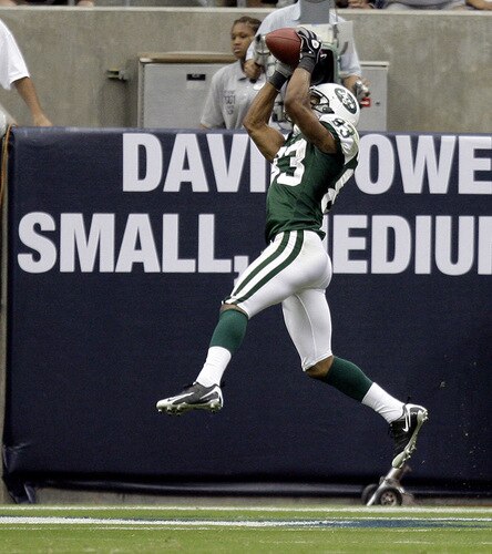 HOUSTON - SEPTEMBER 13:  Wide receiver Chansi Stuckey #83 of the New York Jets goes up for a touchdown reception in the second quarter against the Houston Texans at Reliant Stadium on September 13, 2009 in Houston, Texas.  <br /><br /><span class="help">(Photo by Bob Levey/Getty Images)</span>