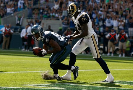 SEATTLE , WA - SEPTEMBER 13:  Nate Burleson #81 of the Seattle Seahawks catches a touchdown against Ron Bartell #24 of the St. Louis Rams at Qwest Field on September 13, 2009 in Seattle, Washington.  <br /><br /><span class="help">(Photo by Jonathan Ferrey/Getty Images)</span>