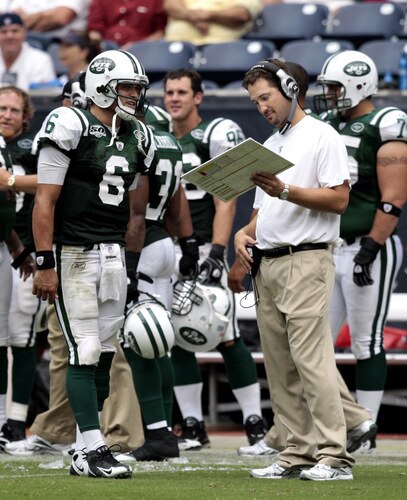 HOUSTON - SEPTEMBER 13:  Quarterback Mark Sanchez #6 of the New York Jets talks with offensive coordinator Brian Schottenheimer at Reliant Stadium on September 13, 2009 in Houston, Texas.  <br /><br /><span class="help">(Photo by Bob Levey/Getty Images)</span>