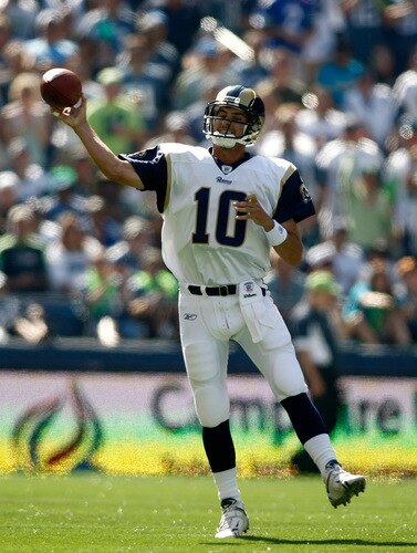 SEATTLE , WA - SEPTEMBER 13:  Marc Bugler #10 of the St. Louis Rams throws the ball against the Seattle Seahawks at Qwest Field on September 13, 2009 in Seattle, Washington.  <br /><br /><span class="help">(Photo by Jonathan Ferrey/Getty Images)</span>