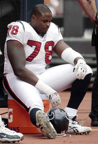 HOUSTON - SEPTEMBER 13:  A dejected  Rashad Butler #78 of the Houston Texans sits on the bench at Reliant Stadium on September 13, 2009 in Houston, Texas.  <br /><br /><span class="help">(Photo by Bob Levey/Getty Images)</span>
