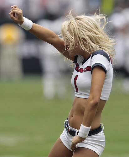 HOUSTON - SEPTEMBER 13:  Houston Texans cheerleaders peform at Reliant Stadium on September 13, 2009 in Houston, Texas.  <br /><br /><span class="help">(Photo by Bob Levey/Getty Images)</span>