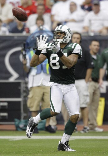 HOUSTON - SEPTEMBER 13: Tight-end Dustin Keller #81 of the New York Jets complete a reception in the third quarter at Reliant Stadium on September 13, 2009 in Houston, Texas.  <br /><br /><span class="help">(Photo by Bob Levey/Getty Images)</span>