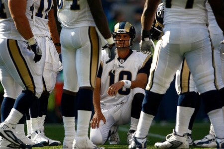 SEATTLE , WA - SEPTEMBER 13:  Marc Bugler #10 of the St. Louis Rams stands in the huddle against the Seattle Seahawks at Qwest Field on September 13, 2009 in Seattle, Washington.  <br /><br /><span class="help">(Photo by Jonathan Ferrey/Getty Images)</span>