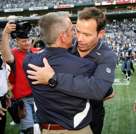 SEATTLE - SEPTEMBER 13:  Head coach Jim Mora (R) of the Seattle Seahawks is congratulated by head coach Steve Spagnuolo of the St. Louis Rams after the game on September 13, 2009 at Qwest Field in Seattle, Washington. The Seahawks defeated the Rams 28-0. <br /><br /><span class="help">(Photo by Otto Greule Jr/Getty Images)</span>