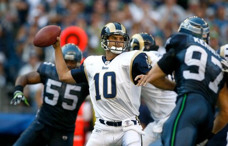 SEATTLE , WA - SEPTEMBER 13:  Marc Bugler #10 of the St. Louis Rams throws the ball against the Seattle Seahawks at Qwest Field on September 13, 2009 in Seattle, Washington.  <br /><br /><span class="help">(Photo by Jonathan Ferrey/Getty Images)</span>