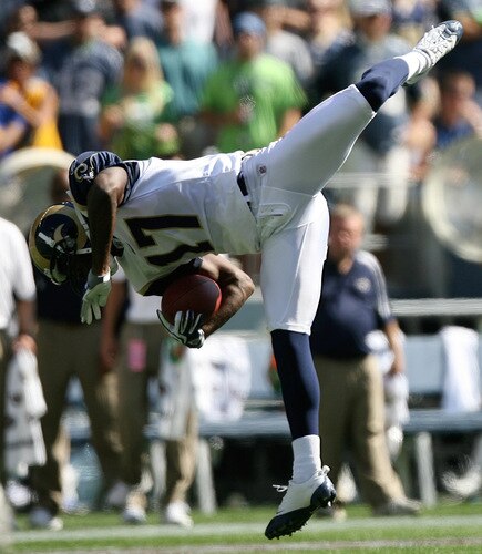 SEATTLE - SEPTEMBER 13:  Wide receiver Donnie Avery #17 of the St. Louis Rams goes airborne as he is tackled during the game against the Seattle Seahawks on September 13, 2009 at Qwest Field in Seattle, Washington. The Seahawks defeated the Rams 28-0. <br /><br /><span class="help">(Photo by Otto Greule Jr/Getty Images)</span>