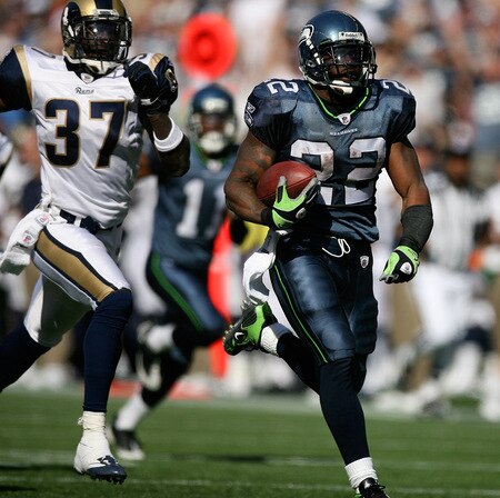 SEATTLE - SEPTEMBER 13:  Running back Julius Jones #22 of the Seattle Seahawks rushes for a touchdown in the third quarter against James Butler #37 of the St. Louis Rams on September 13, 2009 at Qwest Field in Seattle, Washington. The Seahawks defeated the Rams 28-0. <br /><br /><span class="help">(Photo by Otto Greule Jr/Getty Images)</span>