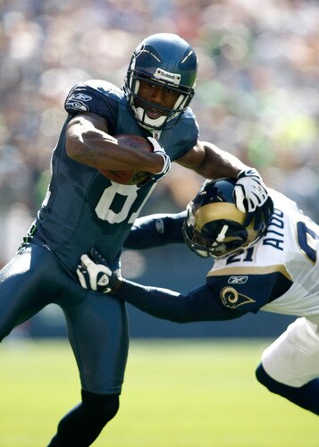 SEATTLE , WA - SEPTEMBER 13:  Nate Burleson #81 of the Seattle Seahawks Oshiomogho Atogwe  #21 against the St. Louis Rams at Qwest Field on September 13, 2009 in Seattle, Washington.  <br /><br /><span class="help">(Photo by Jonathan Ferrey/Getty Images)</span>