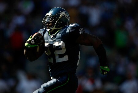SEATTLE , WA - SEPTEMBER 13:  Julius Jones #22 runs for a touchdown against the Seattle Seahawks of the St. Louis Rams at Qwest Field on September 13, 2009 in Seattle, Washington.  <br /><br /><span class="help">(Photo by Jonathan Ferrey/Getty Images)</span>