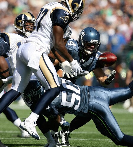 SEATTLE - SEPTEMBER 13:  Will Herring #54 of the Seattle Seahawks recovers a fumble by Donnie Avery #17 on the opening kickoff against the St. Louis Rams on September 13, 2009 at Qwest Field in Seattle, Washington. The Seahawks defeated the Rams 28-0. <br /><br /><span class="help">(Photo by Otto Greule Jr/Getty Images)</span>