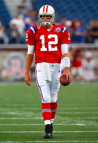 FOXBORO, MA - SEPTEMBER 14:  Quarterback Tom Brady #12 of the New England Patriots walks up the field during warm ups before the game against the Buffalo Bills on September 14, 2009 at Gillette Stadium in Foxboro, Massachusetts. <br /><br /><span class="help">(Photo by Jim Rogash/Getty Images)</span>