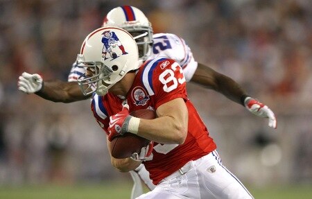 FOXBORO, MA - SEPTEMBER 14:  Wes Welker #83 of the New England Patriots catches a pass in front of John Wendling #21 of the Buffalo Bills on September 14, 2009 at Gillette Stadium in Foxboro, Massachusetts. <br /><br /><span class="help">(Photo by Elsa/Getty Images)</span>