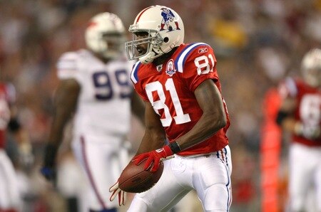 FOXBORO, MA - SEPTEMBER 14:  Randy Moss #81 of the New England Patriots celebrates a play during the game against the Buffalo Bills on September 14, 2009 at Gillette Stadium in Foxboro, Massachusetts. <br /><br /><span class="help">(Photo by Elsa/Getty Images)</span>
