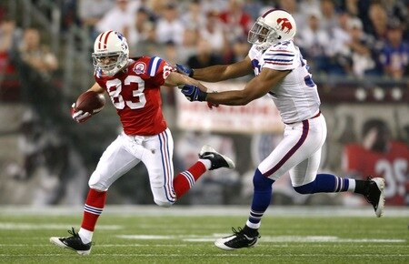 FOXBORO, MA - SEPTEMBER 14:  Wes Welker #83 of the New England Patriots runs away from George Wilson #37 of the Buffalo Bills on September 14, 2009 at Gillette Stadium in Foxboro, Massachusetts. <br /><br /><span class="help">(Photo by Elsa/Getty Images)</span>