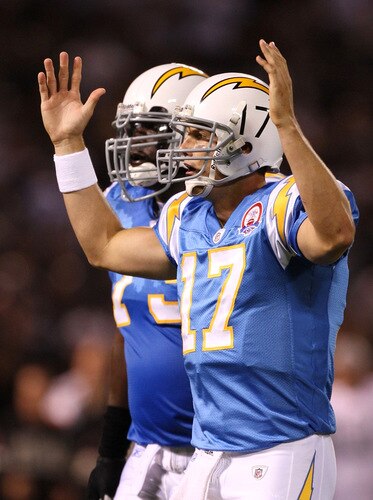 OAKLAND, CA - SEPTEMBER 14:  Quarterback Philip Rivers #17 of the San Diego Chargers celebrates after LaDainian Tomlinson #21 scored a 1-yard rushing touchdown in the second quarter against the Oakland Raiders on September 14, 2009 at the Oakland-Alameda County Coliseum in Oakland, California.  <br /><br /><span class="help">(Photo by Ezra Shaw/Getty Images)</span>