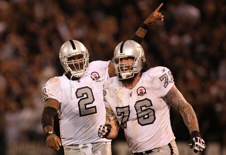 OAKLAND, CA - SEPTEMBER 14:  (L-R) JaMarcus Russell #2 and Robert Gallery #76 of the Oakland Raiders celebrate after Russell threw a 57-yard touchdown pass to Louis Murphy #18 in the fourth quarter against the San Diego Chargers on September 14, 2009 at the Oakland-Alameda County Coliseum in Oakland, California.  <br /><br /><span class="help">(Photo by Ezra Shaw/Getty Images)</span>