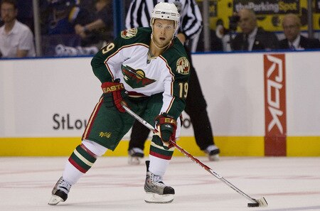 ST. LOUIS, MO. - SEPTEMBER 15: Andy Hilbert #19 of the Minnesota Wild moves the puck up ice against the St. Louis Blues at the Scottrade Center on September 15, 2009 in St. Louis, Missouri.  <br /><br /><span class="help">(Photo by Dilip Vishwanat/Getty Images)</span>