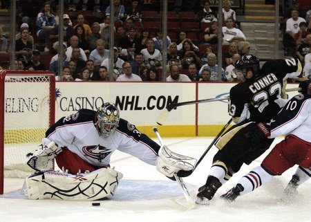 PITTSBURGH, PA - SEPTEMBER 15:  Chris Conner #23 of the Pittsburgh Penguins takes a shot on Mathieu Garon #32 of the Columbus Blue Jackets in the second period at Mellon Arena on September 15, 2009 in Pittsburgh, Pennsylvania.  <br /><br /><span class="help">(Photo by Justin K. Aller/Getty Images)</span>