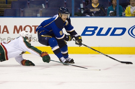 ST. LOUIS, MO. - SEPTEMBER 15: Paul Kariya #9 of the St. Louis Blues moves the puck up ice against the Minnesota Wild at the Scottrade Center on September 15, 2009 in St. Louis, Missouri.  <br /><br /><span class="help">(Photo by Dilip Vishwanat/Getty Images)</span>