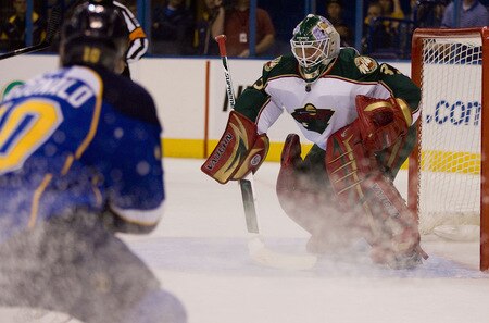 ST. LOUIS, MO. - SEPTEMBER 15: Anton Khudobin #35 of the Minnesota Wild defends against the St. Louis Blues at the Scottrade Center on September 15, 2009 in St. Louis, Missouri.  <br /><br /><span class="help">(Photo by Dilip Vishwanat/Getty Images)</span>