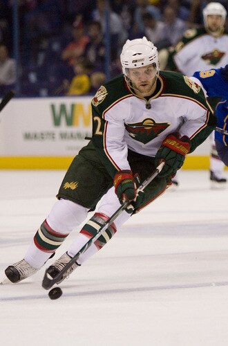 ST. LOUIS, MO. - SEPTEMBER 15: Craig Weller #12 of the Minnesota Wild moves the puck up the ice against the St. Louis Blues at the Scottrade Center on September 15, 2009 in St. Louis, Missouri.  The Blues beat the Wild 3-1.  <br /><br /><span class="help">(Photo by Dilip Vishwanat/Getty Images)</span>