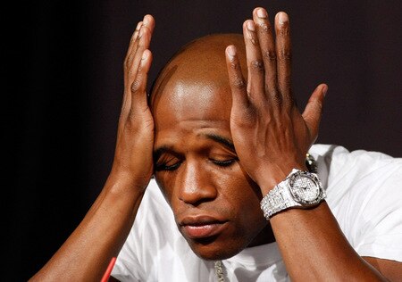 LAS VEGAS - SEPTEMBER 16:  Boxer Floyd Mayweather Jr. rubs his face during the final news conference for his bout against Juan Manuel Marquez at the MGM Grand Hotel/Casino September 16, 2009 in Las Vegas, Nevada. The two will fight at the MGM Grand Garden Arena on September 19 in Las Vegas.  <br /><br /><span class="help">(Photo by Ethan Miller/Getty Images)</span>