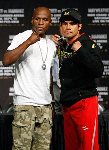 LAS VEGAS - SEPTEMBER 16:  Boxers Floyd Mayweather Jr. (L) and Juan Manuel Marquez pose during their final news conference at the MGM Grand Hotel/Casino September 16, 2009 in Las Vegas, Nevada. The two will fight at the MGM Grand Garden Arena on September 19 in Las Vegas.  <br /><br /><span class="help">(Photo by Ethan Miller/Getty Images)</span>