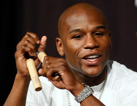 LAS VEGAS - SEPTEMBER 16:  Boxer Floyd Mayweather Jr. uses a hand grip during the final news conference for his bout against Juan Manuel Marquez at the MGM Grand Hotel/Casino September 16, 2009 in Las Vegas, Nevada. The two will fight at the MGM Grand Garden Arena on September 19 in Las Vegas.  <br /><br /><span class="help">(Photo by Ethan Miller/Getty Images)</span>