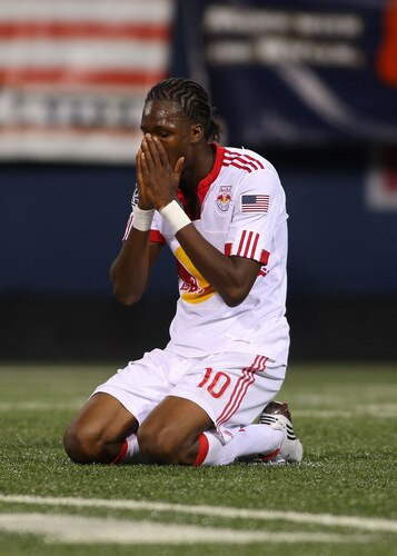 EAST RUTHERFORD, NJ - SEPTEMBER 18:  Macoumba Kandji #10 of the New York Red Bulls reacts after missing a scoring chance in the final moments of the game against the New England Revolution at Giants Stadium in the Meadowlands on September 18, 2009 in East Rutherford, New Jersey. The Revolution and Red Bulls played to a 1-1 tie.  <br /><br /><span class="help">(Photo by Mike Stobe/Getty Images for New York Red Bull)</span>