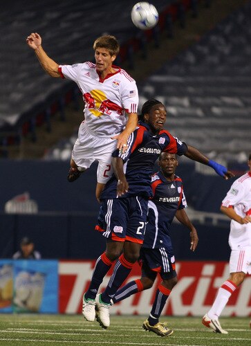 EAST RUTHERFORD, NJ - SEPTEMBER 18:  Andrew Boyens #27 of the New York Red Bulls battles for the ball against Shalrie Joseph #21 of the New England Revolution at Giants Stadium in the Meadowlands on September 18, 2009 in East Rutherford, New Jersey. Revolution and Red Bulls play to a 1-1 tie  <br /><br /><span class="help">(Photo by Mike Stobe/Getty Images for New York Red Bull)</span>