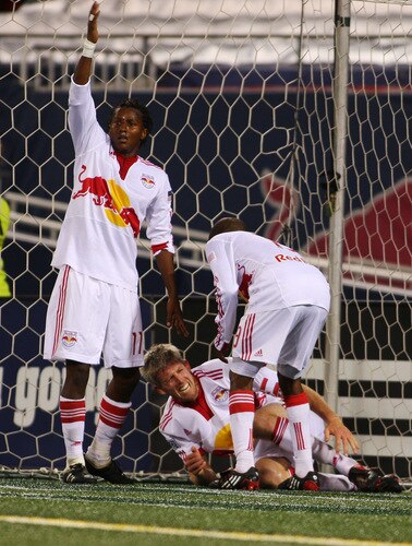 EAST RUTHERFORD, NJ - SEPTEMBER 18:  John Wolyniec #15 of the New York Red Bulls is injured after scoring a goal in the 69th minutes against the New England Revolution at Giants Stadium in the Meadowlands on September 18, 2009 in East Rutherford, New Jersey. Revolution and Red Bulls play to a 1-1 tie  <br /><br /><span class="help">(Photo by Mike Stobe/Getty Images for New York Red Bull)</span>