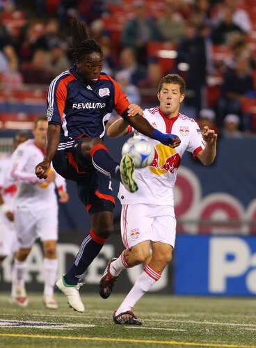 EAST RUTHERFORD, NJ - SEPTEMBER 18:  Luke Sassano #32 of the New York Red Bulls battles for the ball against Shalrie Joseph #21 of the New England Revolution at Giants Stadium in the Meadowlands on September 18, 2009 in East Rutherford, New Jersey. Revolution and Red Bulls play to a 1-1 tie  <br /><br /><span class="help">(Photo by Mike Stobe/Getty Images for New York Red Bull)</span>