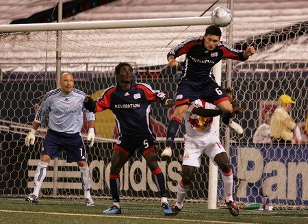 EAST RUTHERFORD, NJ - SEPTEMBER 18:  Jay Heaps #6 of the New England Revolution heads the ball against the New York Red Bulls at Giants Stadium in the Meadowlands on September 18, 2009 in East Rutherford, New Jersey. Revolution and Red Bulls play to a 1-1 tie  <br /><br /><span class="help">(Photo by Mike Stobe/Getty Images for New York Red Bull)</span>