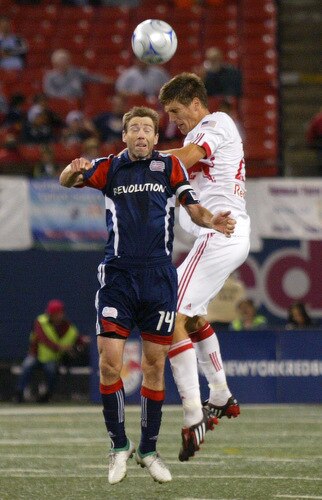 EAST RUTHERFORD, NJ - SEPTEMBER 18: Andrew Boyens #27 of the New York Red Bulls and Steve Ralston #14 of the New England Revolution go up for a header during their game at Giants Stadium on September 18, 2009 in East Rutherford, New Jersey. The Red Bulls and the Revolution played to a 1-1 tie.  <br /><br /><span class="help">(Photo by Andy Marlin/Getty Images for New York Red Bulls)</span>