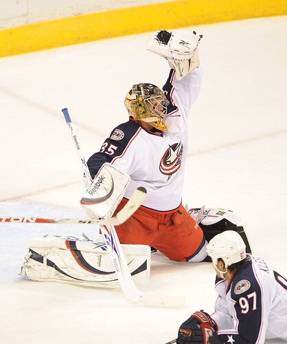 ST. PAUL, MN - SEPTEMBER 18: Kevin Lalande #35 of the Columbus Blue Jackets makes a save during the third period in a preseason game on September 18, 2009 at the Xcel Energy Center in St. Paul, Minnesota. <br /><br /><span class="help">(Photo by Tom Dahlin/Getty Images)</span>