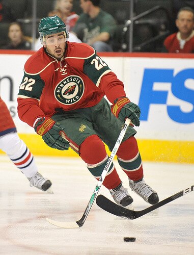 ST. PAUL, MN - SEPTEMBER 18: Cal Clutterbuck #22 of the Minnesota Wild chases the puck during the first period in a preseason game on September 18, 2009 at the Xcel Energy Center in St. Paul, Minnesota. <br /><br /><span class="help">(Photo by Tom Dahlin/Getty Images)</span>