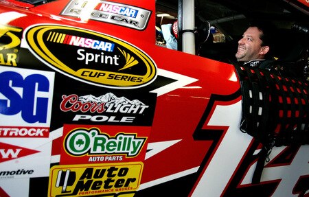LOUDON, NH - SEPTEMBER 19:  Tony Stewart sits aboard the #14 Old Spice/Office Depot Chevrolet prior to practice for the NASCAR Sprint Cup Series Sylvania 300 at the New Hampshire Motor Speedway on September 19, 2009 in Loudon, New Hampshire  <br /><br /><span class="help">(Photo by Jason Smith/Getty Images for NASCAR)</span>